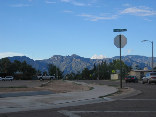 The mountains as seen from an intersection next to a nearby school.